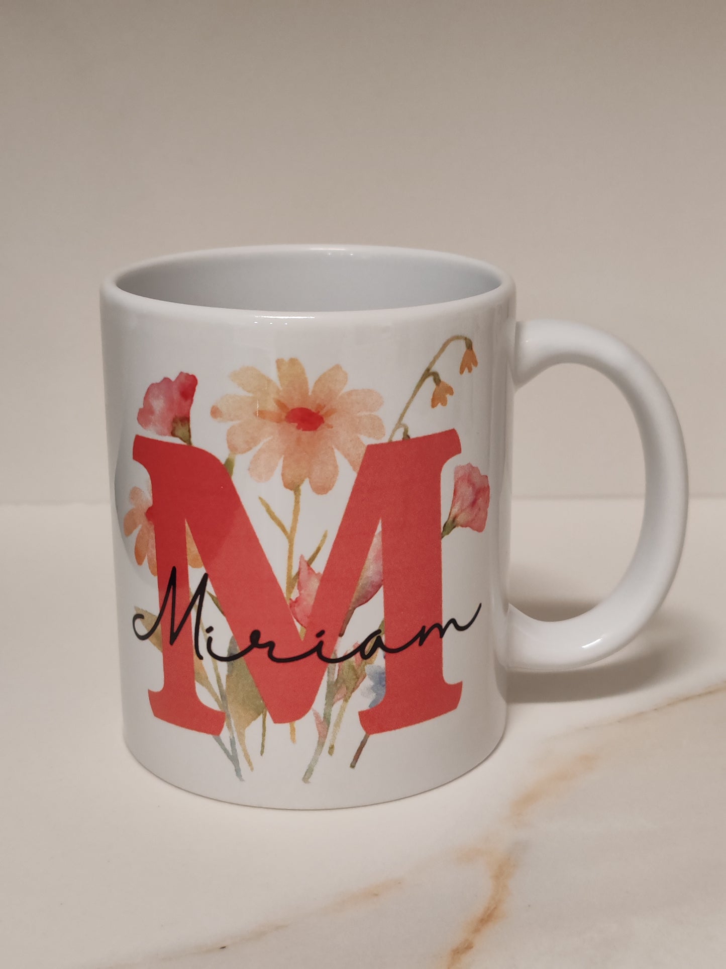 Taza subliminada inicial i nombre