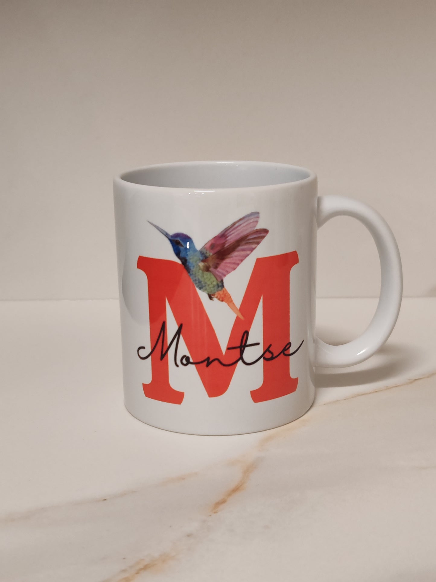 Taza subliminada inicial i nombre